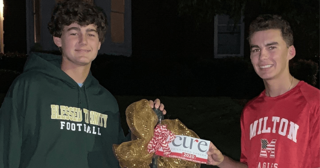 Brothers Fight Pediatric Cancer with Gold Bows