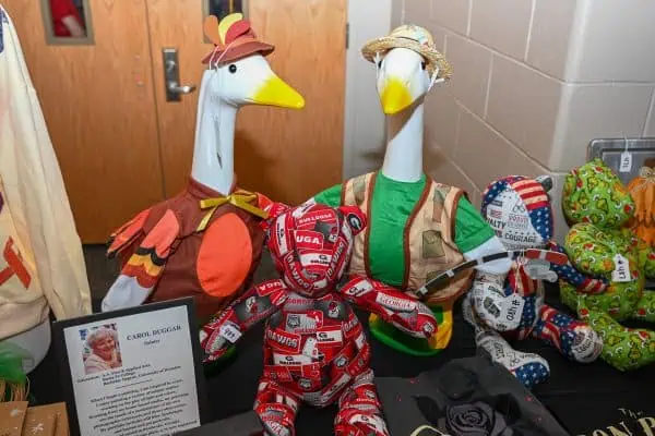 Creative duck sculptures made from UGA and other themed fabrics for charity event.