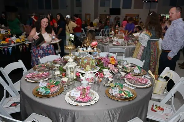 Elegant table setup at CURE Childhood Cancer fundraising event.