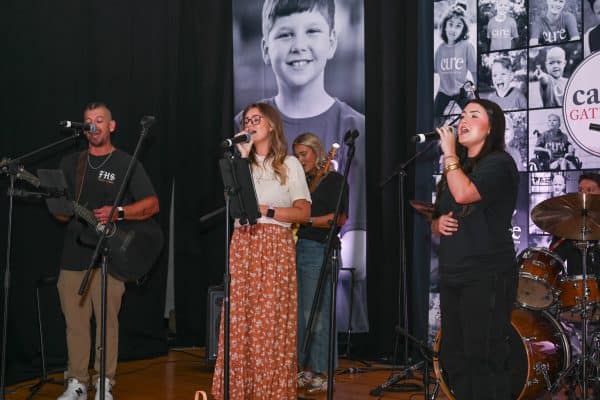 Musicians performing at CURE Childhood Cancer event in Bryan County.
