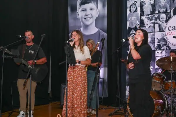 Musicians performing at CURE Childhood Cancer event in Bryan County.