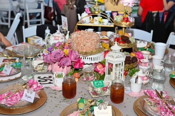 Table at Catie's Gathering with name tags sitting on plates